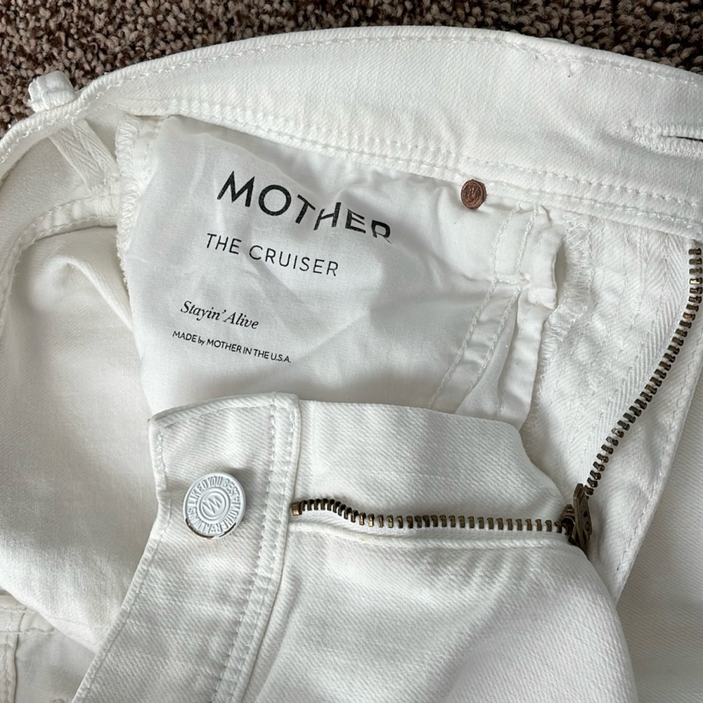 Mother boot cut white jean. Size 24